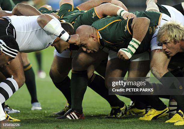 Fiji's prop Deacon Manu , South Africa's Springbok prop Gurthro Steenkamp and flanker Schalk Burger scrum during the 2011 Rugby World Cup pool D...
