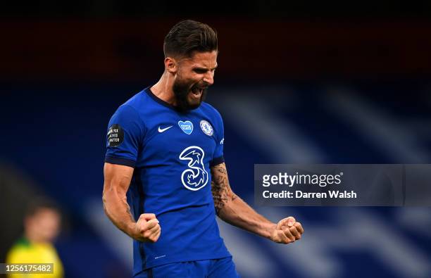 Olivier Giroud of Chelsea celebrates after scoring his sides first goal during the Premier League match between Chelsea FC and Norwich City at...