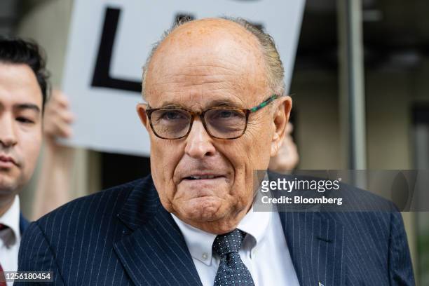 Rudy Giuliani, former lawyer to Donald Trump, exits federal court in Washington, DC, US, on Friday, May 19, 2023. Giuliani is facing allegations that...