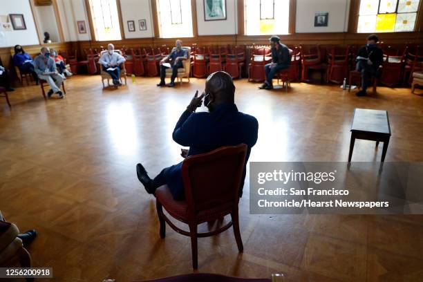 James Dixon, HealthRIGHT 360 Director of Residential Services, leads a staff meeting at the residential drug treatment program in San Francisco,...