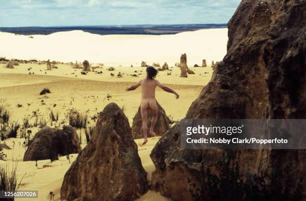 Scottish comedian Billy Connolly dancing in the nude through The Pinnacles, a formation of limestone rocks in the Nambung National Park, during the...