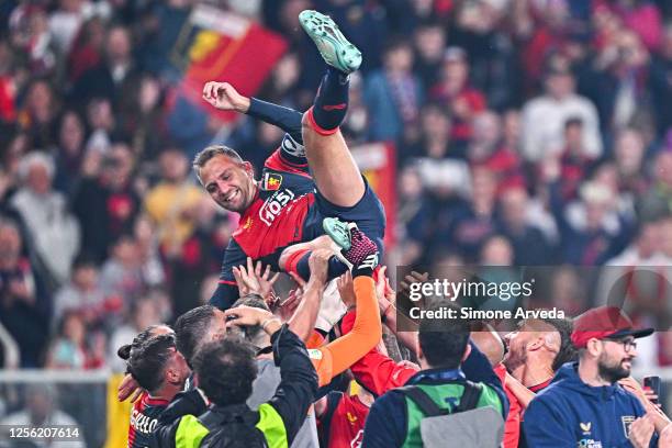 Domenico Criscito of Genoa gets lifted by his team-mates as he announces his retirement after the Serie B match between Genoa CFC and Bari at Stadio...