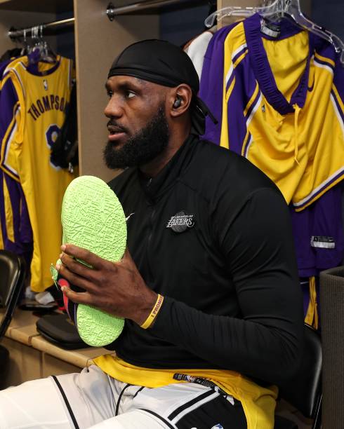 LeBron James of the Los Angeles Lakers gets ready in the locker room before Game 1 of the 2023 NBA Playoffs Western Conference Finals on May 16, 2023...