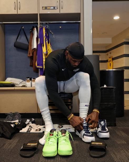 LeBron James of the Los Angeles Lakers gets ready in the locker room before Game 1 of the 2023 NBA Playoffs Western Conference Finals on May 16, 2023...