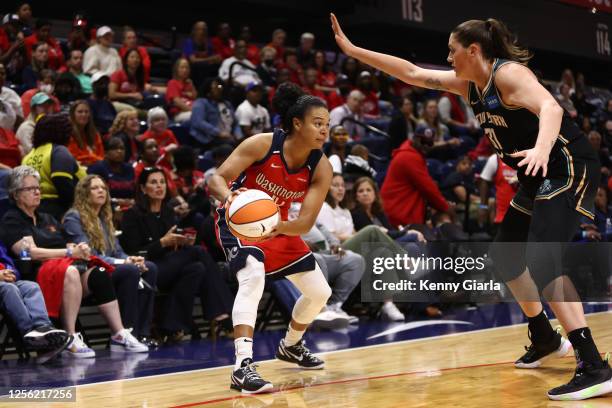 Kristi Toliver of the Washington Mystics handles the ball during the game against the New York Liberty on May 19, 2023 at Entertainment & Sports...