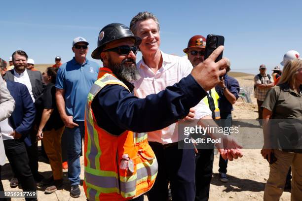 California Governor Gavin Newsom gets a selfie taken with a Union worker at the construction of the Battery Energy Storage Systems for the future...