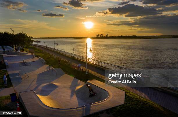 An aerial view of a man skateboarding in a skatepark on July 14, 2020 in Long Beach, New York. Local sports are starting to pick up in New York...