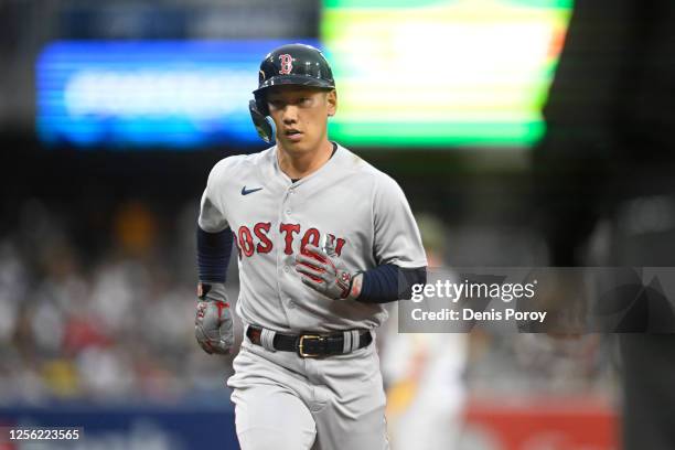 Masataka Yoshida of the Boston Red Sox leads off first base during the second inning of a baseball game against the San Diego Padres at Petco Park on...