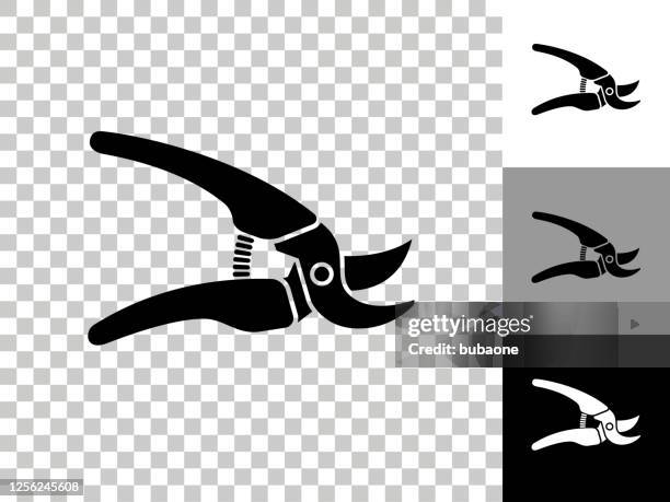 gardening tools icon on checkerboard transparent background - secators stock illustrations