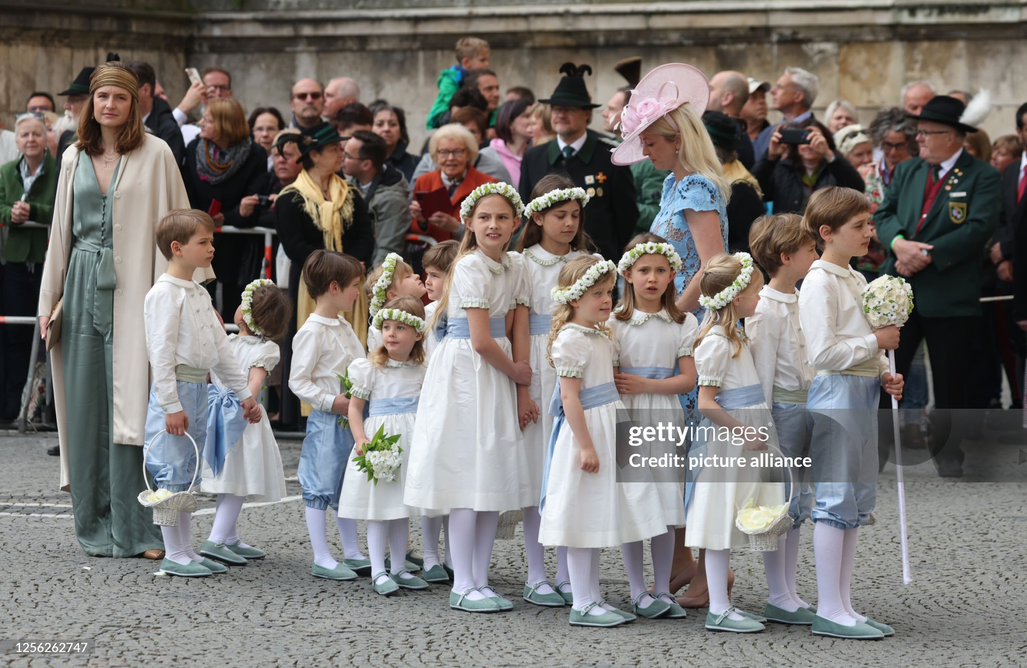 20-may-2023-bavaria-munich-the-flower-children-and-page-boys-wait-for-the-start-of-the-church.jpg