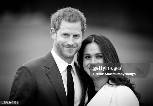 Prince Harry and Meghan Markle attend an official photocall to announce their engagement at The Sunken Gardens, Kensington Palace on November 27,...