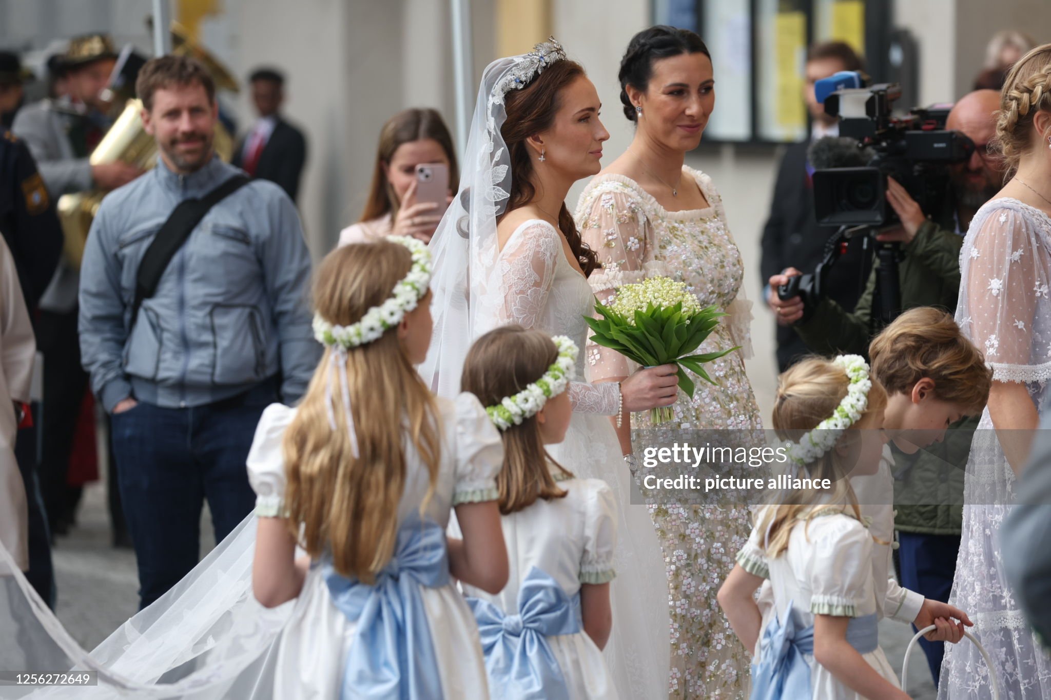 20-may-2023-bavaria-munich-the-bride-sophie-alexandra-evekink-enters-the-theatinerkirche-with.jpg