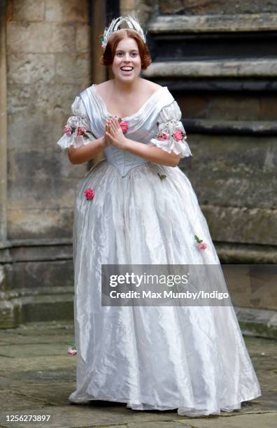 Princess Beatrice poses for photographs, whilst wearing period costume, during a break in filming on the set of 'The Young Victoria' at Lincoln...