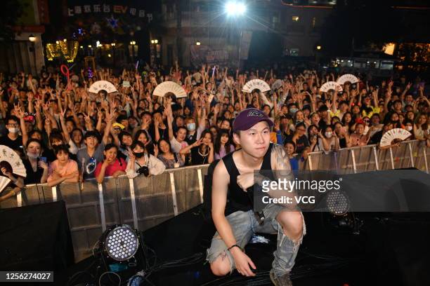 Singer poses with the audience for a photo during the EV Electronic Music Festival at the Happy Valley Shanghai on July 11, 2020 in Shanghai, China.