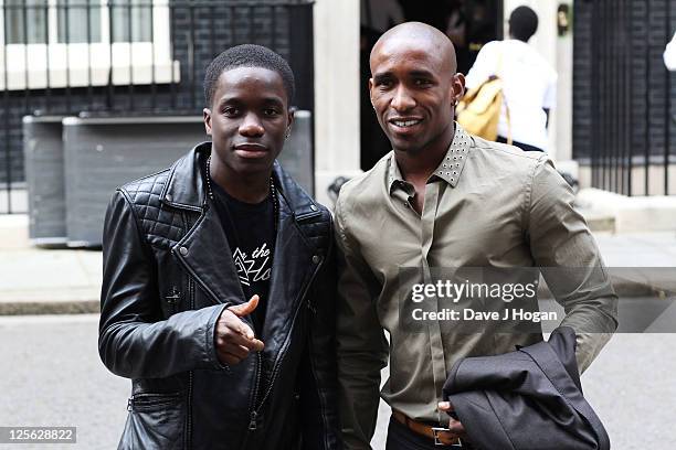 Tinchy Stryder and Jermain Defoe attend a reception hosted by David Cameron ahead of the Spirit Of London Awards to be held at The Royal Albert Hall...