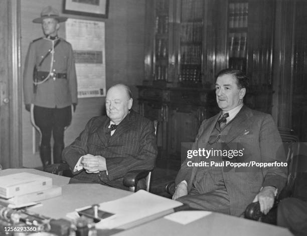 Prime Minister of the United Kingdom Winston Churchill meets with Maurice Duplessis , Premier of Quebec, for talks in a meeting room at the...