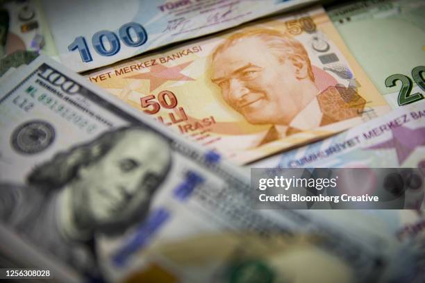 turkish lira banknotes and american u.s. dollar bills - fifty dollar bill stockfoto's en -beelden