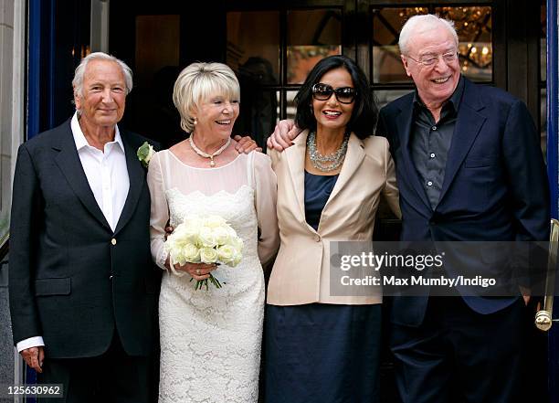 Michael Winner and Geraldine Lynton-Edwards accompanied by Shakira Caine and Michael Caine leave Chelsea Register Office following their wedding on...