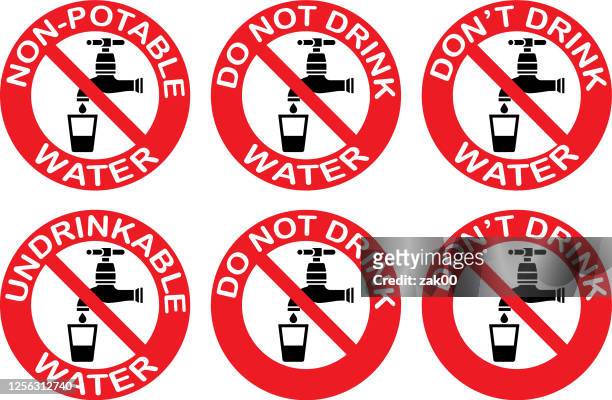 not drinkable water sign. red prohibition non potable water sign. don`t drink water sign. - non potable stock illustrations