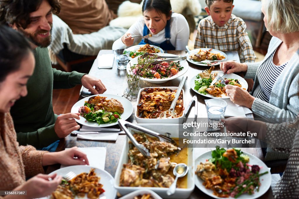 Extended family having meal together