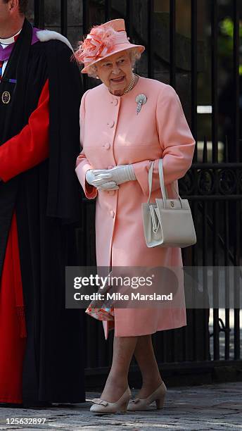 Queen Elizabeth II departs for the Royal wedding of Zara Phillips and Mike Tindall at Canongate Kirk on July 30, 2011 in Edinburgh, Scotland.