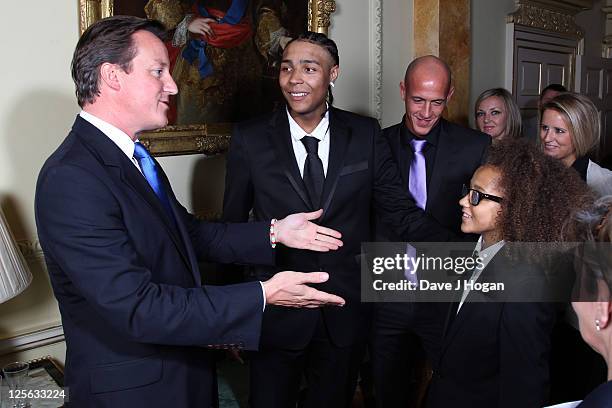 Ashley Banjo and Perri Luc Kiely attend a reception hosted by David Cameron ahead of the Spirit Of London Awards at 10 Downing Street on September...