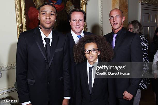 Ashley Banjo and Perri Luc Kiely attend a reception hosted by David Cameron ahead of the Spirit Of London Awards at 10 Downing Street on September...