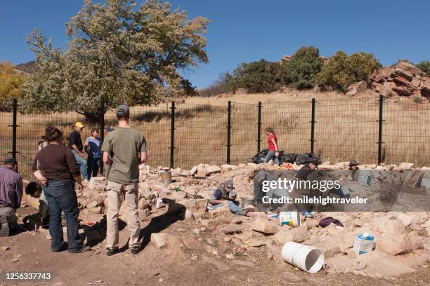 visitors explore bradford perley house and college archaeological dig for ice house - littleton colorado stock pictures, royalty-free photos & images
