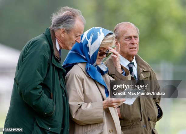 Norton Knatchbull, Lord Brabourne, Prince Philip, Duke of Edinburgh and Penelope Knatchbull, Lady Brabourne attend day 3 of the Royal Windsor Horse...