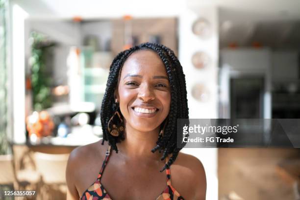 portrait of a woman at home - one mid adult woman only stock pictures, royalty-free photos & images