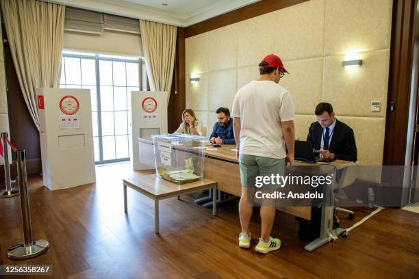 Turkish citizens, living abroad, cast their votes for the second round of Turkiye's presidential election at the Turkish Embassy in Abu Dhabi, United...