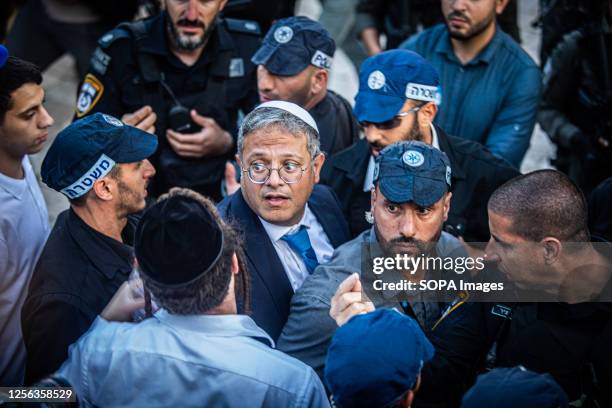 Israeli minister of National Security Itamar Ben-Gvir looks on at Damascus gate In Jerusalem during the flag march. Tens of thousands of young...