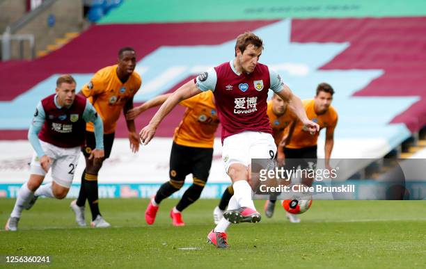 Chris Wood of Burnley scores his sides first goal from the penalty spot during the Premier League match between Burnley FC and Wolverhampton...