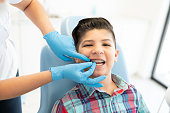 Latin Boy At Dental Clinic