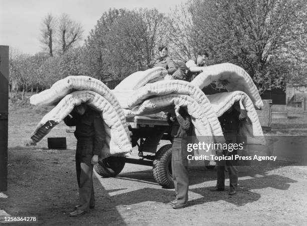 Mattresses being taken to one of two Royal Air Force stations - Uxbridge and West Drayton - which will accommodate over 2,000 Olympic visitors for...