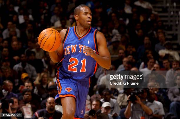Charlie Ward of the New York Knicks handles the ball against the Washington Wizards at the MCI Center on December 7, 2002 in Washington, DC. NOTE TO...