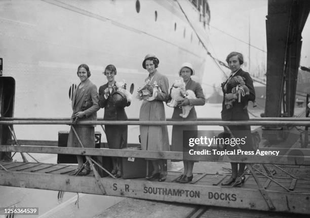 Members of the Great Britain Olympic team , British runner Eileen Hiscock , and British runner Violet Webb ) boarding the Canadian Pacific liner...