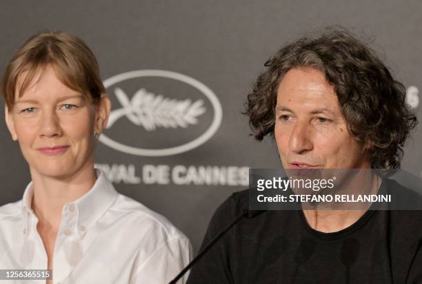 British director Jonathan Glazer speaks during a press conference with German actress Sandra Hueller for the film "The Zone Of Interest" during the...