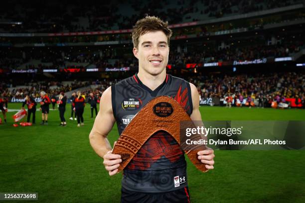 Zach Merrett of the Bombers poses for a photo after winning the Yiooken Award for his Best on Ground performance during the 2023 AFL Round 10 match...