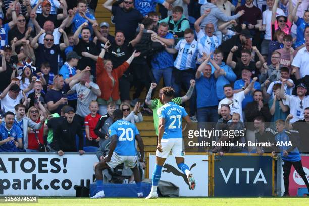 Issac Olaofe of Stockport County celebrates after scoring a goal to make it 1-0 during the Sky Bet League Two Play-Off Semi-Final Second Leg match...