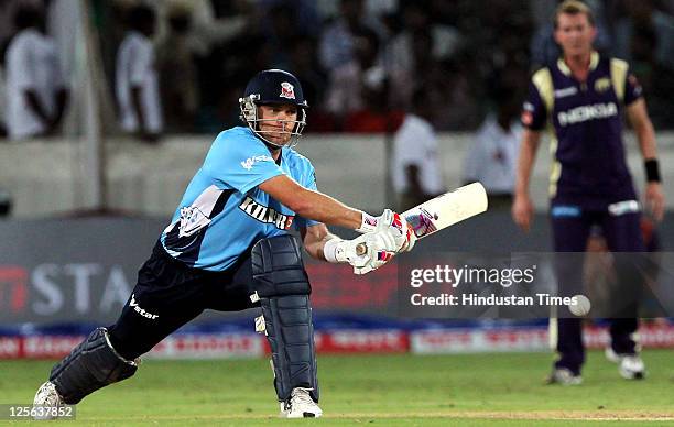 Auckland Aces batsman Lou Vincent plays a reverse sweep shot during the Champions League Twenty20 qualifier match between Kolkata Knight Riders and...