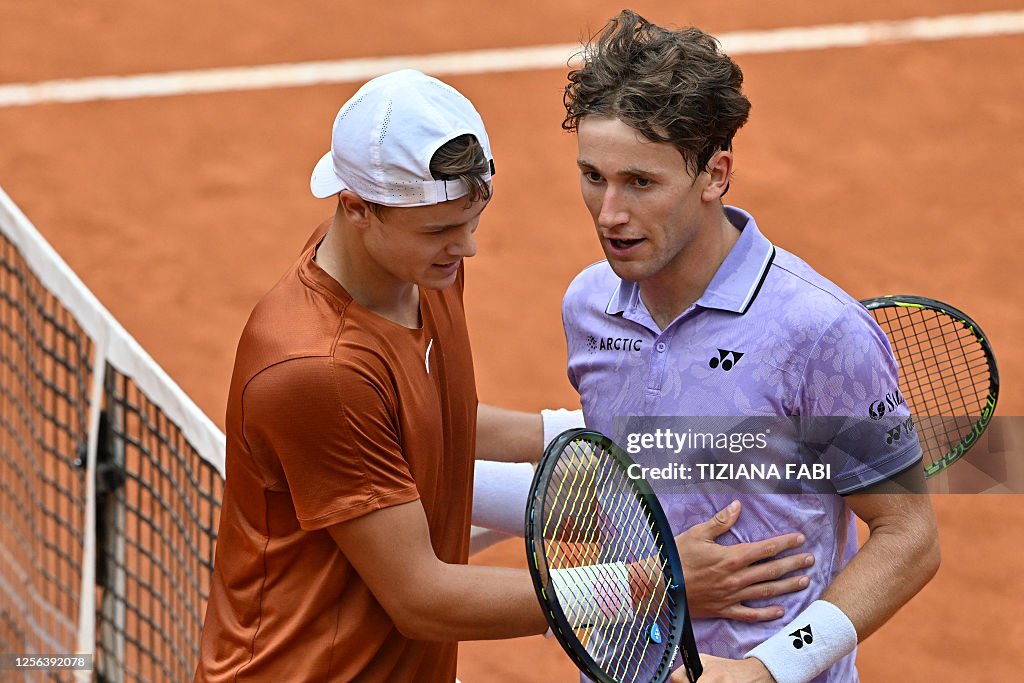 Casper Rune Denmark's Holger Rune hugs Norway's Casper Ruud after he defeated him ...