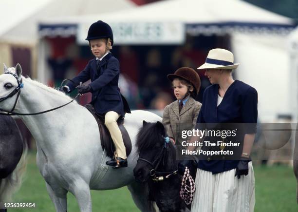 Princess Beatrice and Princess Eugenie , daughters of HRH Prince Andrew and Sarah, Duchess of York, at the Windsor Horse Show, circa May 1994.