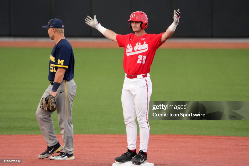Caiden Kaiser of the Ohio State Buckeyes reacts to hitting a double ...