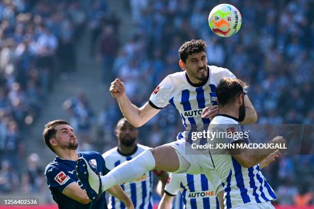 Hertha Berlin's Uruguayan defender Aguistin Rogel heads the ball during the German first division Bundesliga football match between Hertha Berlin and...