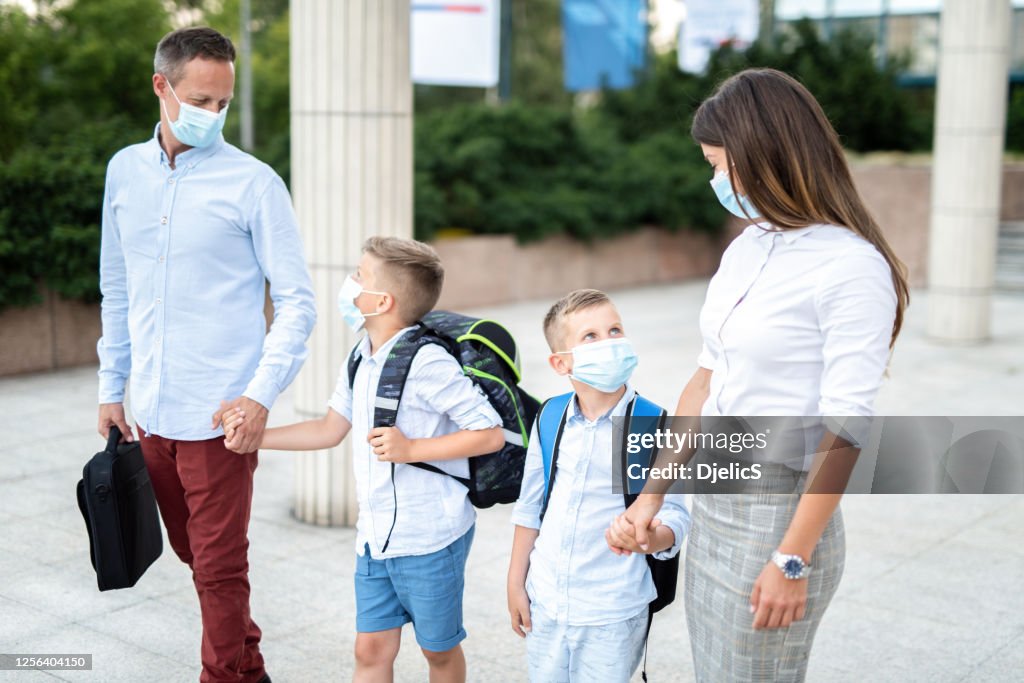Parents Taking Their Boys To School HighRes Stock Photo Getty Images