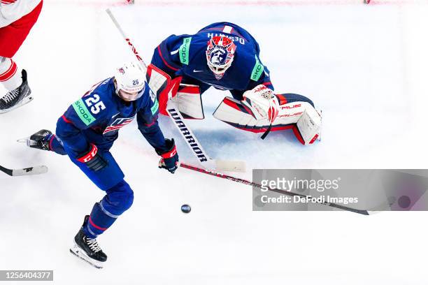 Nick Perbix of USA and Casey Desmith controls the ball during the 2023 IIHF Ice Hockey World Championship Finland - Latvia game between United States...