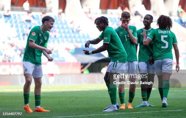 Felcsút , Hungary - 20 May 2023; Ikechukwu Orazi of Republic of Ireland celebrates with teammate Mason Melia, left, after scoring their side's second...