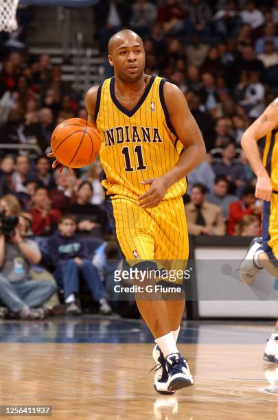 Jamal Tinsley of the Indiana Pacers handles the ball against the Washington Wizards on January 4, 2003 at the MCI Center in Washington DC. NOTE TO...