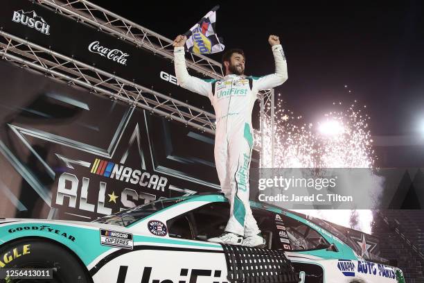 Chase Elliott, driver of the UniFirst Chevrolet, celebrates in Victory Lane after winning the NASCAR Cup Series All-Star Race at Bristol Motor...